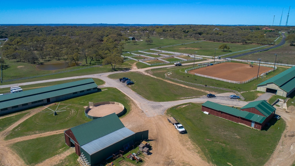 Aerial view of the arenas and barns